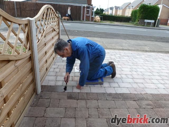 Applying Dyebrick to Driveway.jpg